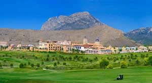 a view of the Villaitana golf course with the hotel in the background